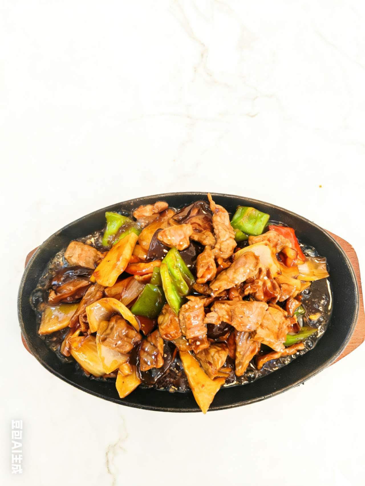 Ternera en fuente quemada al estilo chino